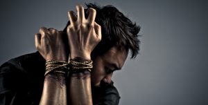 Men caught in the system